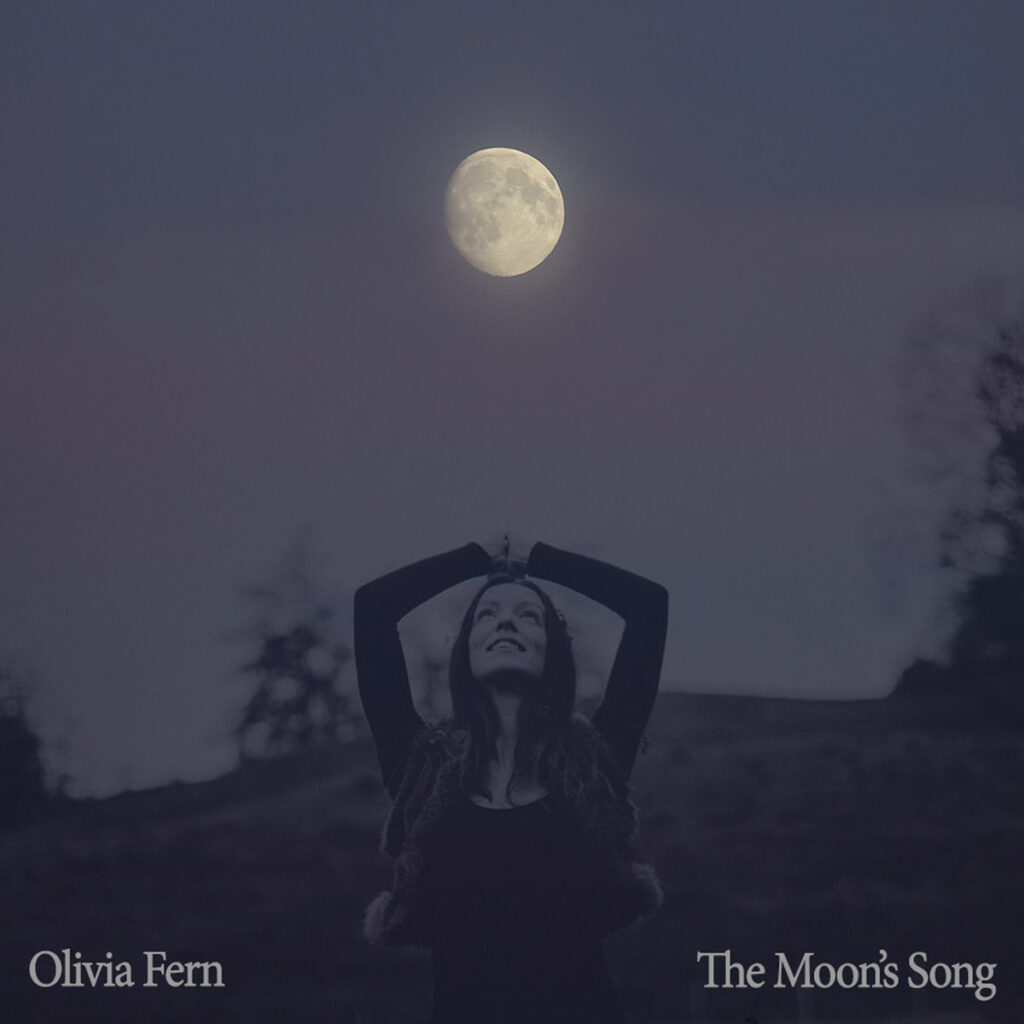 Olivia Fern looks up at the full moon 
